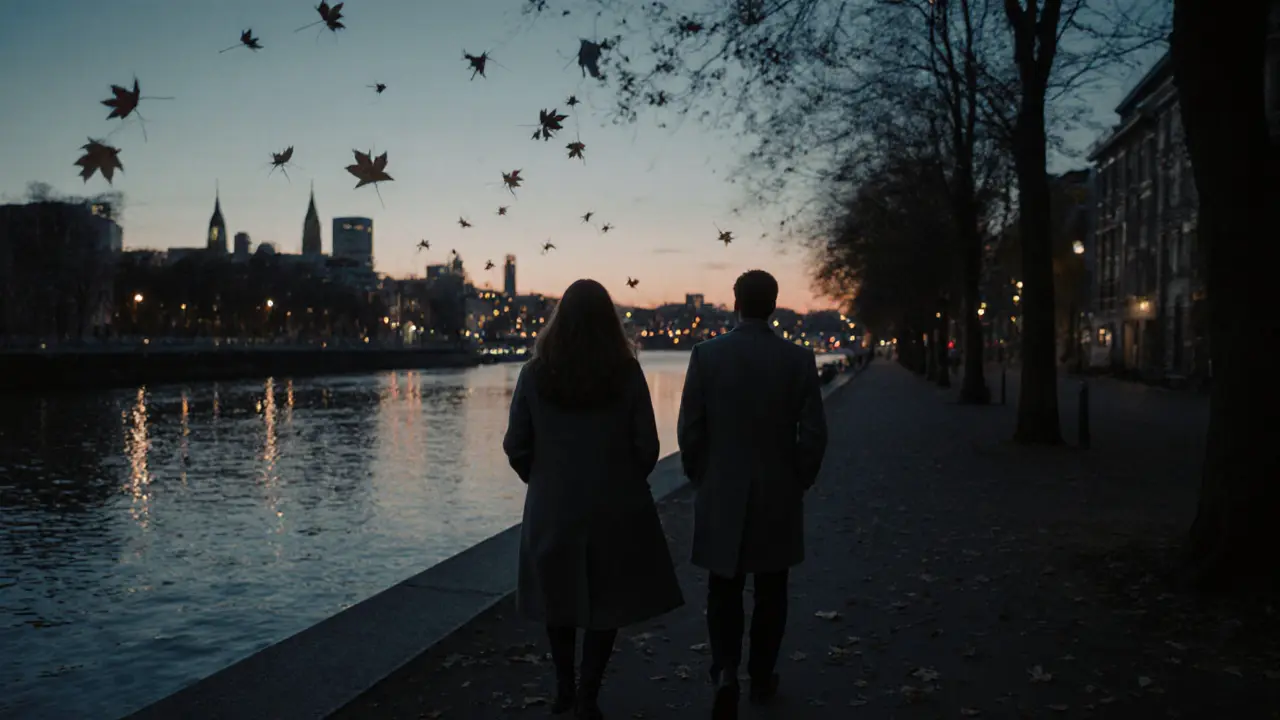 A man and woman walk side by side along the Thames at sunset, sharing silent companionship in the autumn evening.