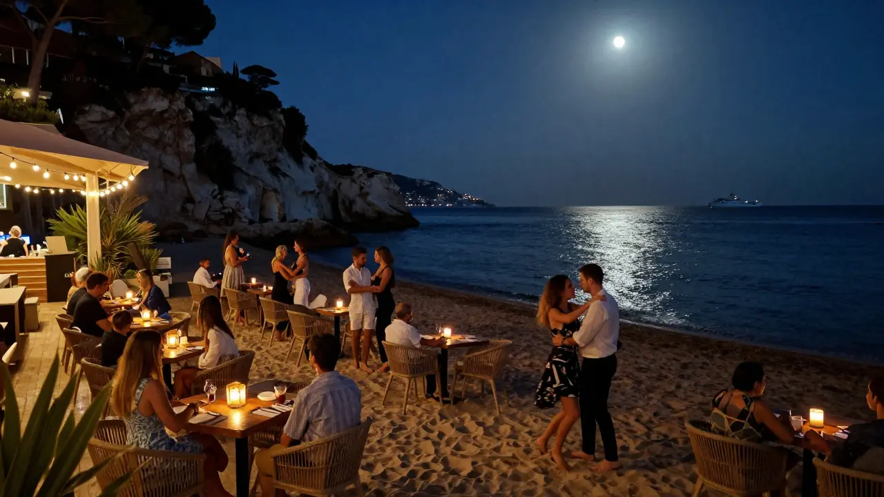 Candlelit beach lounge at night, guests dancing barefoot on sand under string lights with yachts glowing in the distance.