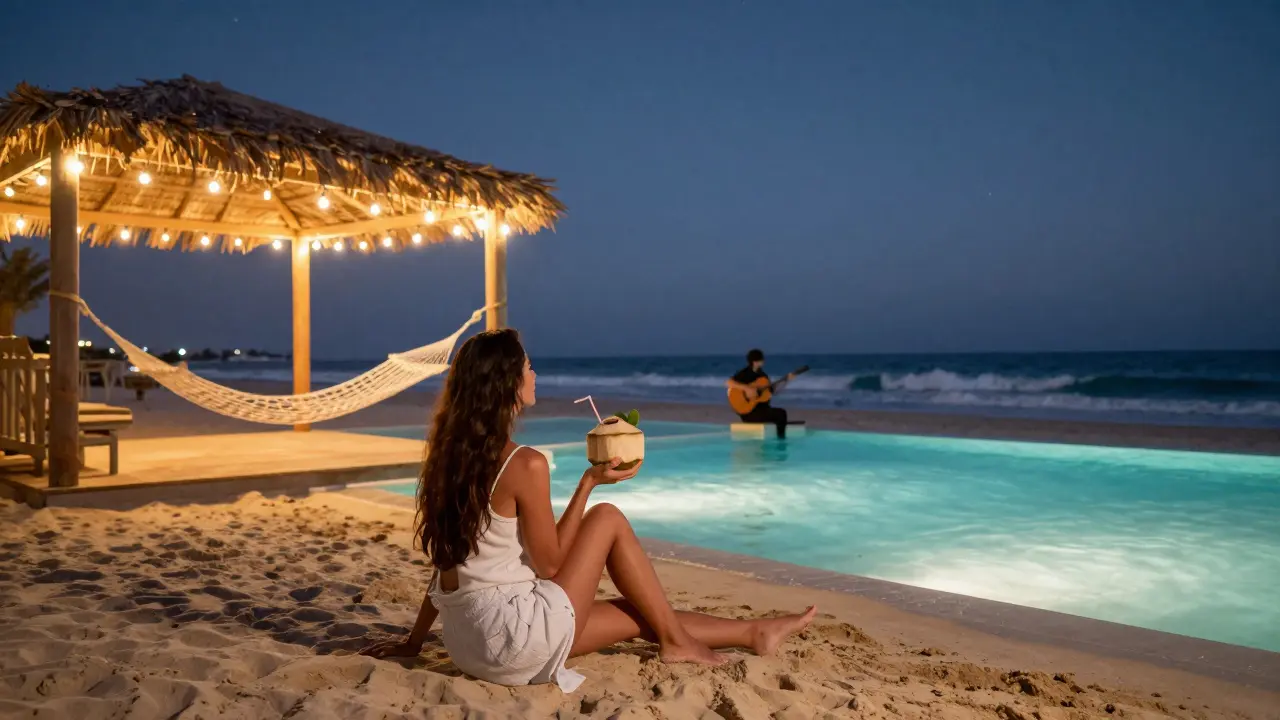 Woman relaxing on a beach at night with glowing pool and acoustic guitarist in the distance.