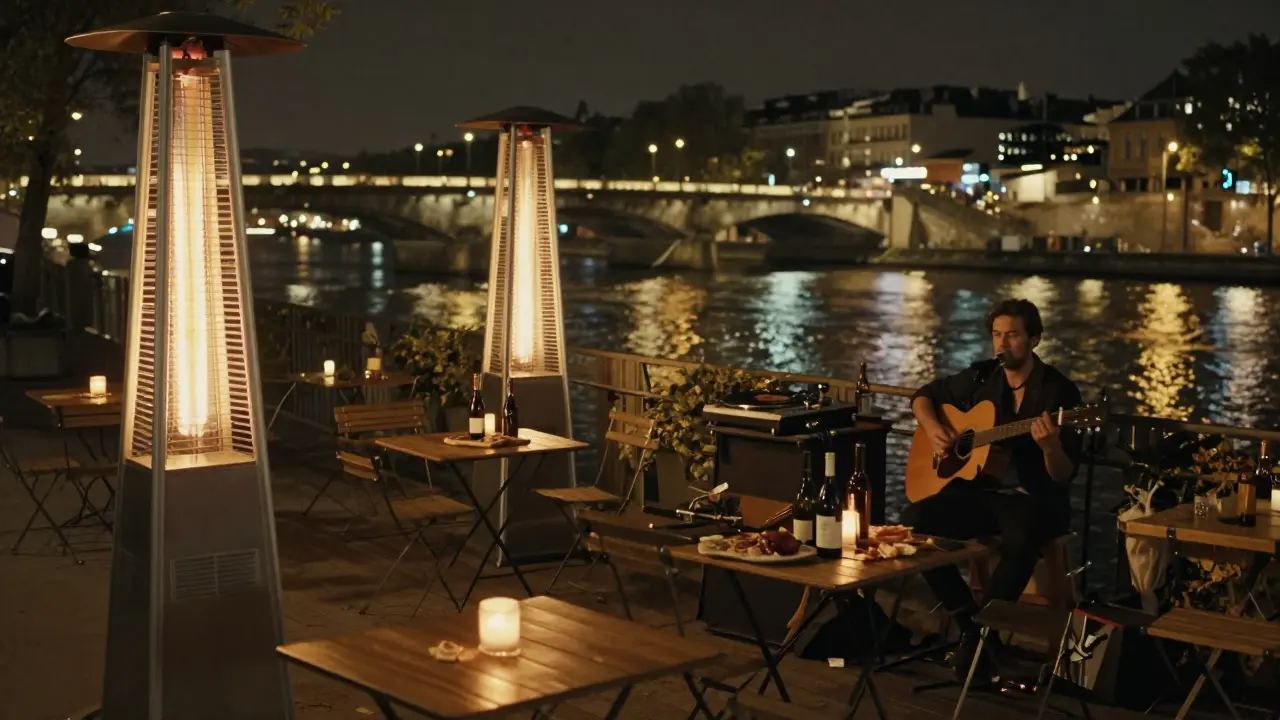 A cozy riverside terrace at night with live music, wine bottles, and golden bridge reflections.