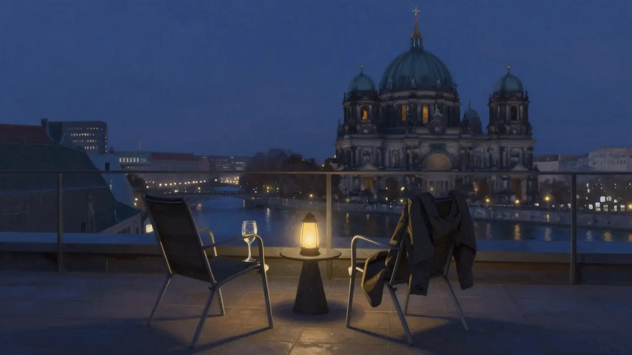 An empty rooftop terrace in Berlin at night, overlooking the Spree River with a single lantern glowing.