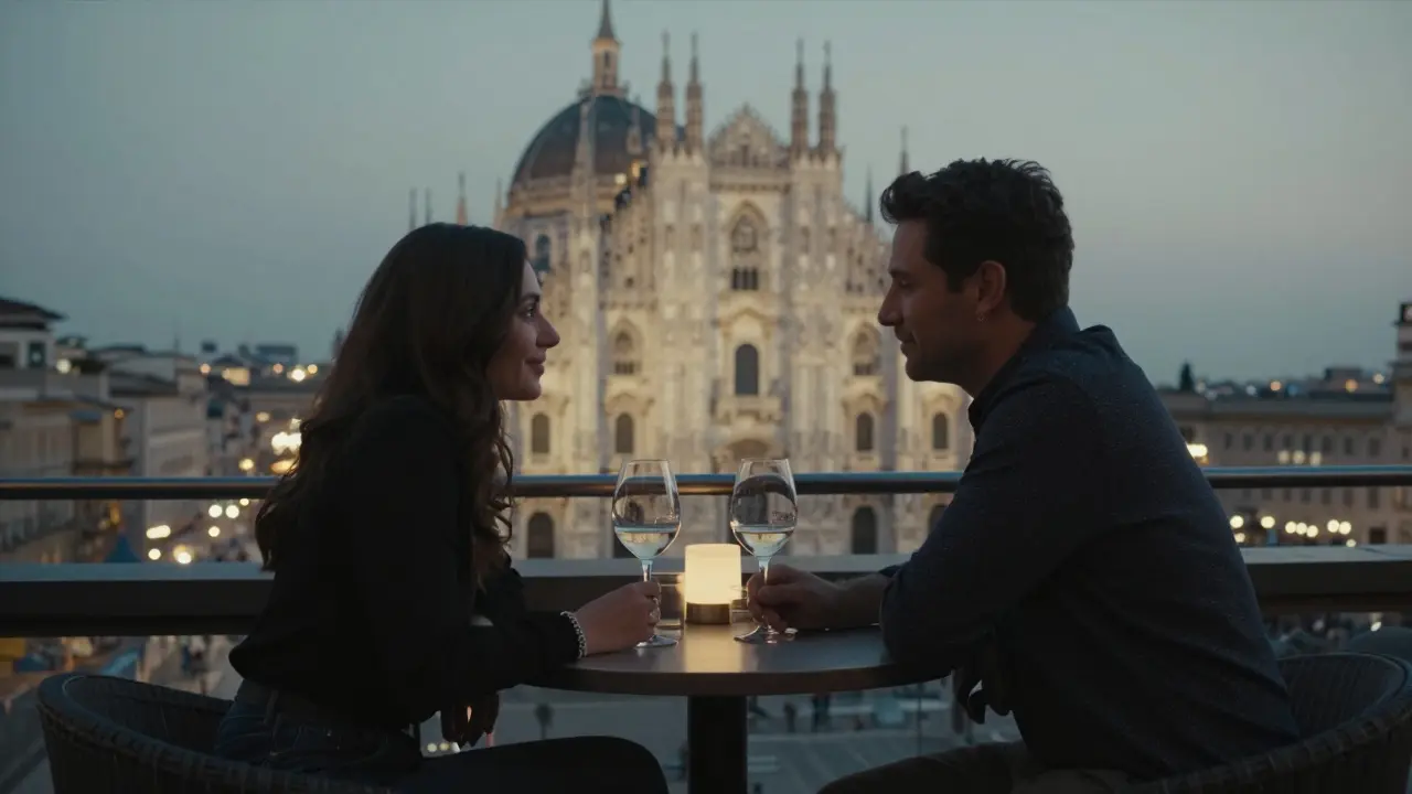 Two people enjoy a quiet evening at a rooftop bar in Milan, overlooking the Duomo with soft city lights in the background.